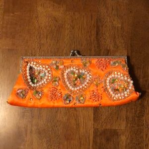 cute orange / floral accent clutch purse